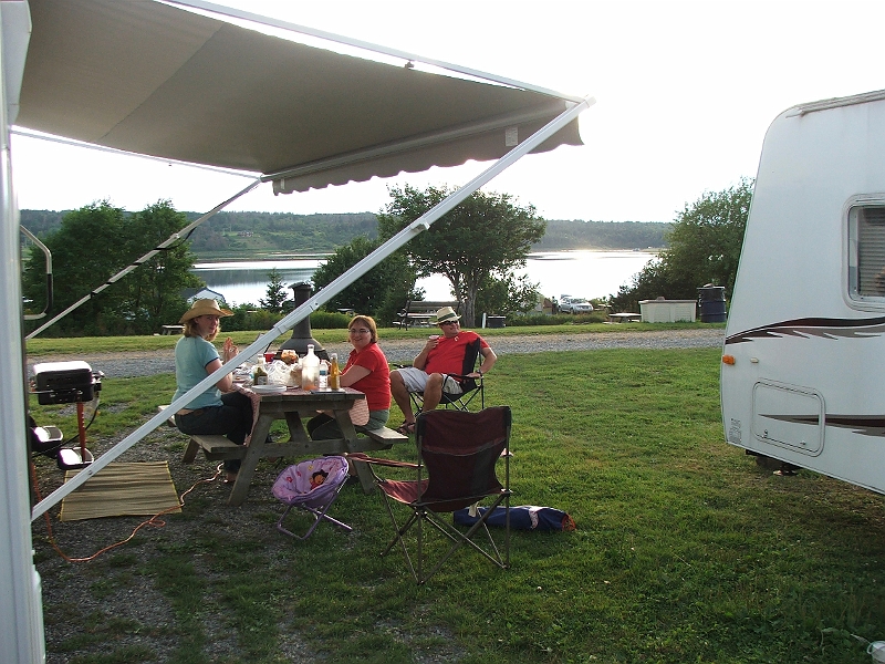 NFLD_drive_to_and-viking_settlement 186.jpg - starting to get the food ready after some boating and setting up